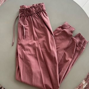 Pink Lululemon joggers. High waisted. Size 6 but fits like a 4/6.